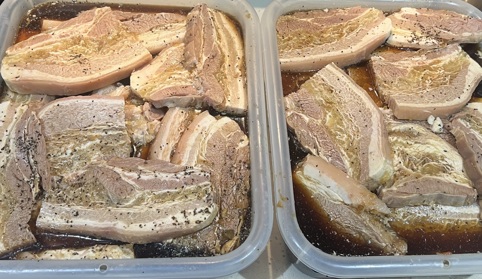 Pork belly strips marinating overnight for inihaw na liempo