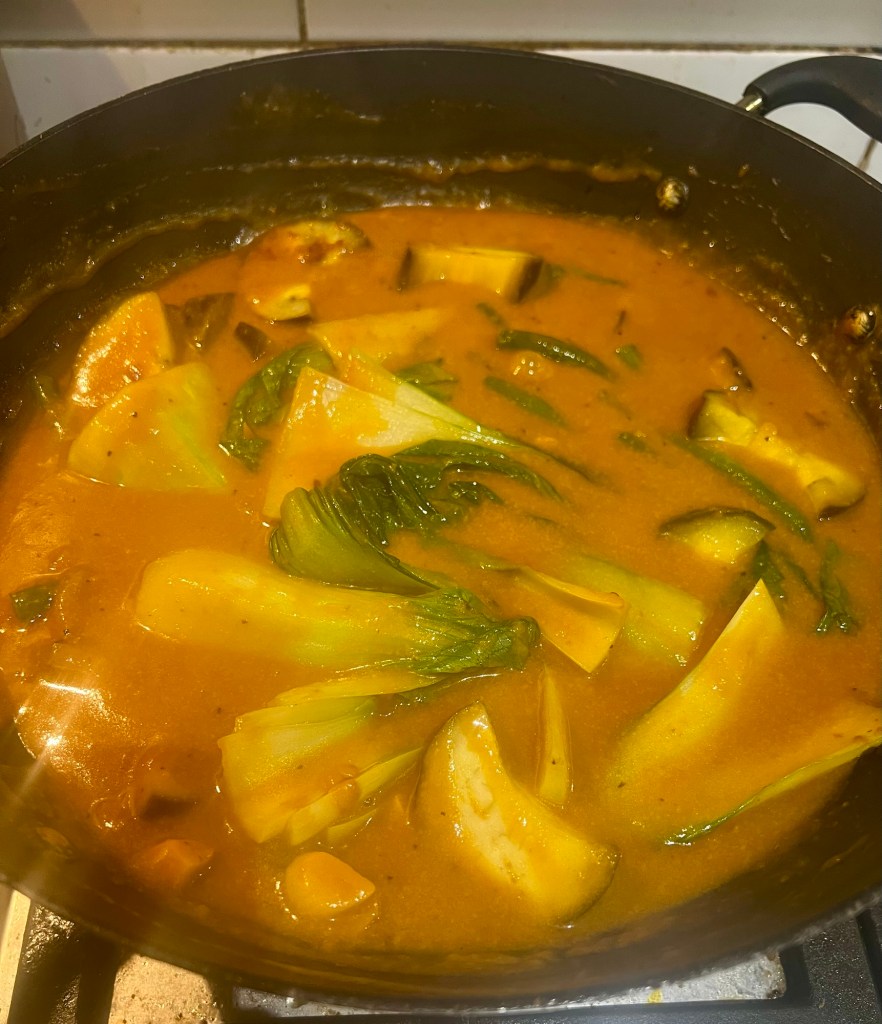 Kare-kare peanut sauce with vegetables in the pan