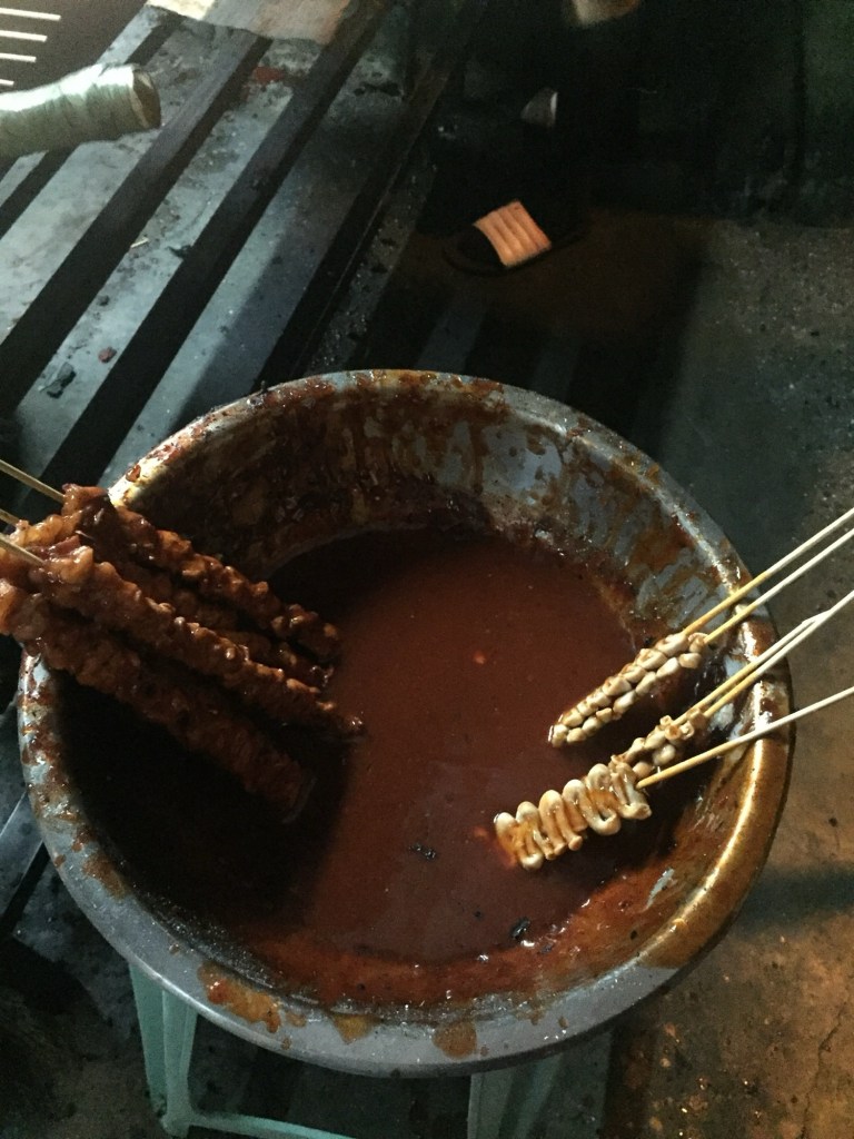 Skewers dipped straight into the glaze balde at Mang Raul's
