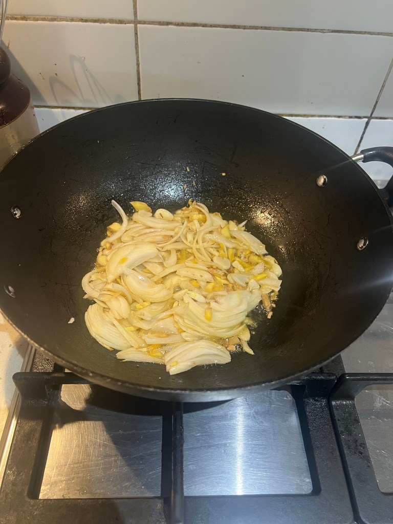 Sautéing onion and ginger